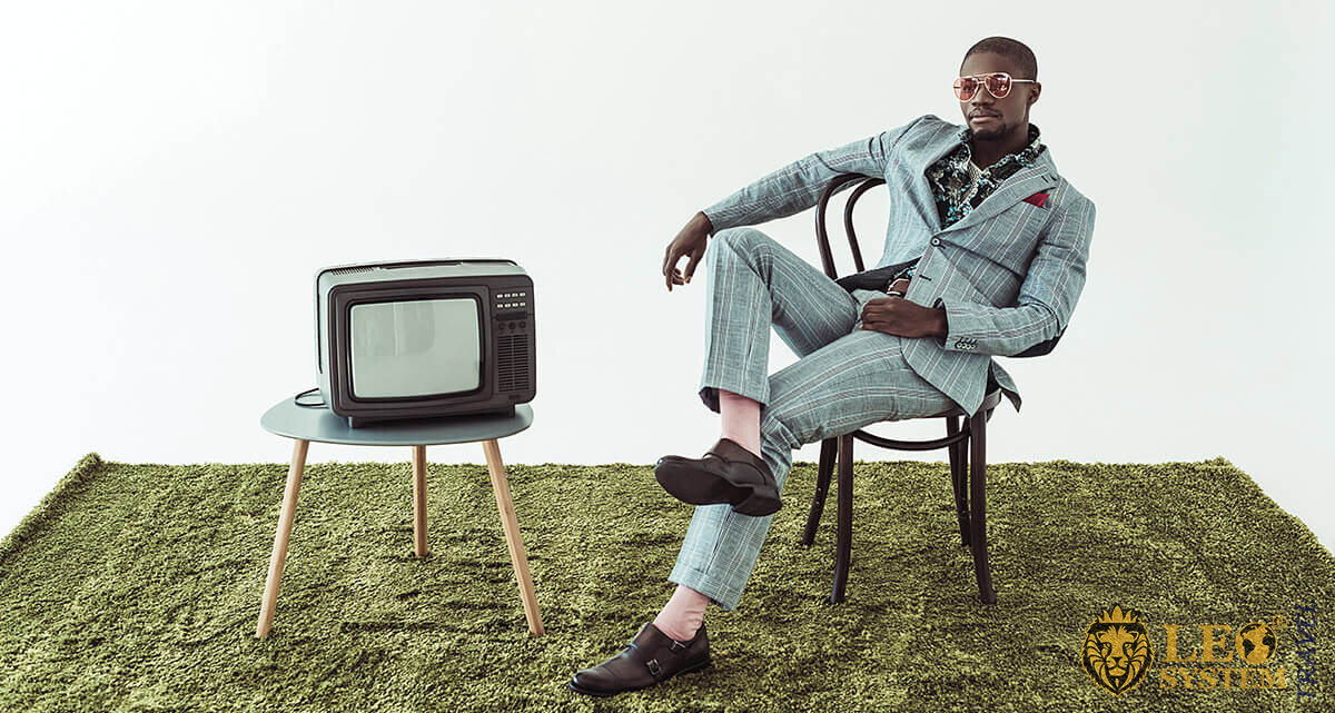 Fashionable American with old TV