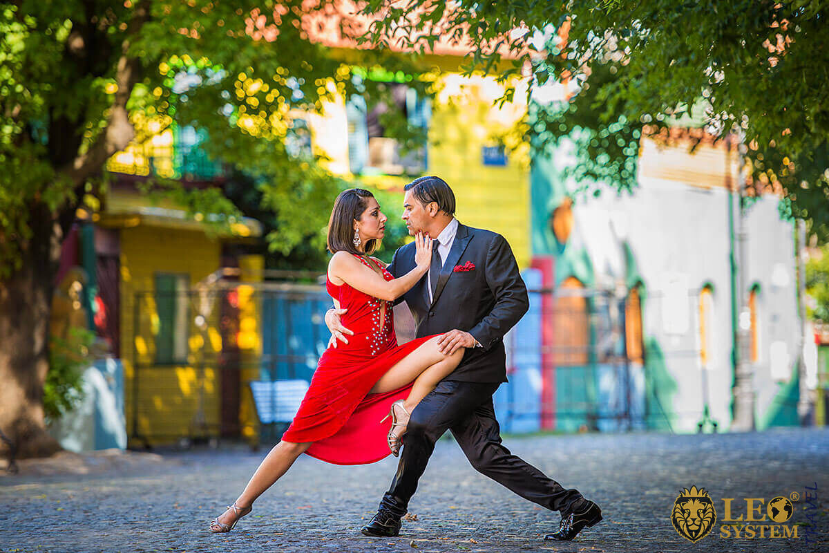 Man and woman dance tango at the Feria de San Telmo Sunday Fair event, Argentina