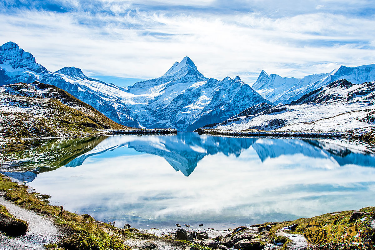 Image of magnificent mountains and lake in Swiss Alps, Switzerland