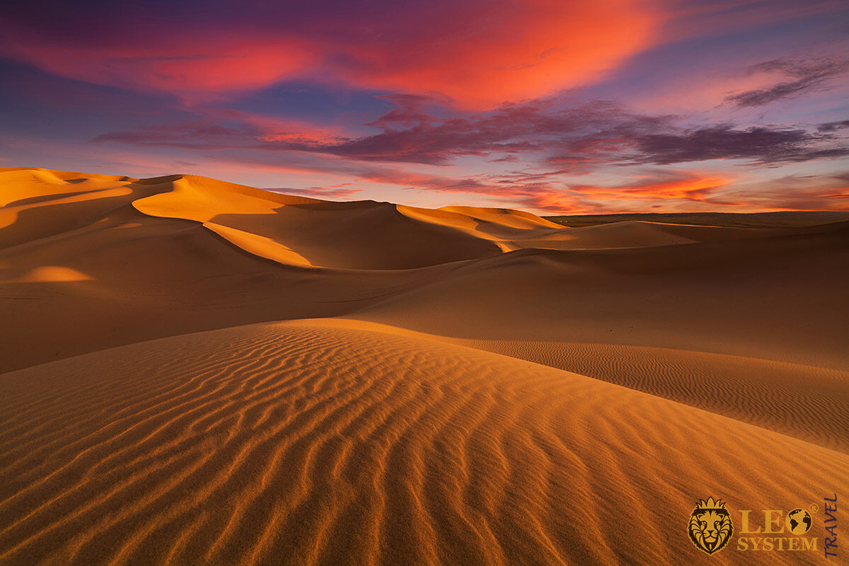 Beautiful view of the Sahara Desert and red sunset
