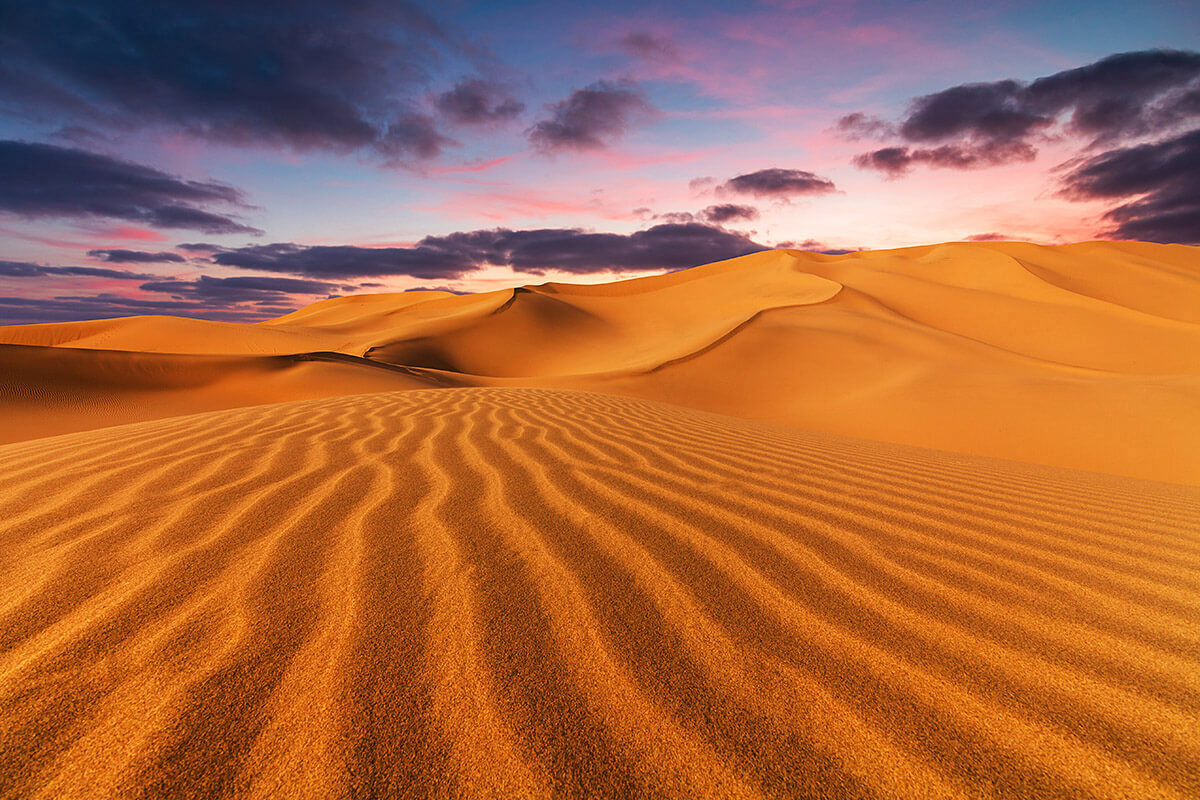 Image of the Sahara Desert at sunset, continent Africa
