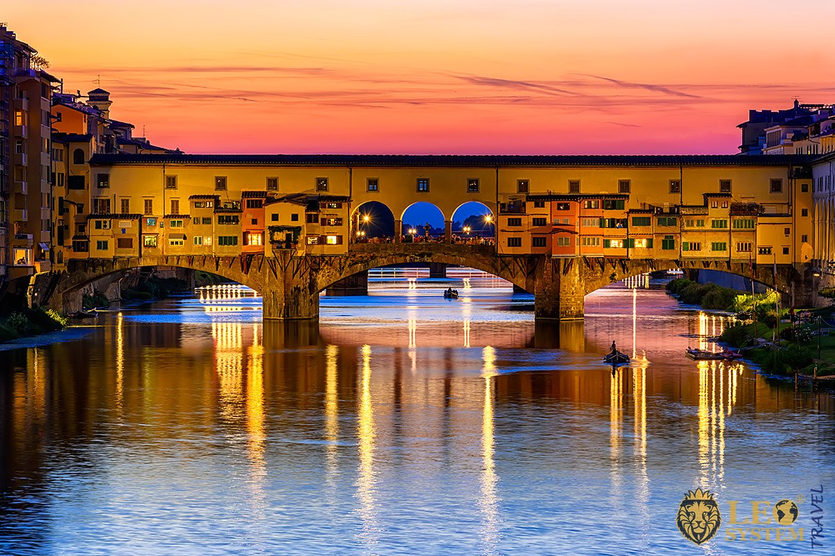 Sunset view of the Ponte Vecchio and the Arno River in Florence, Italy