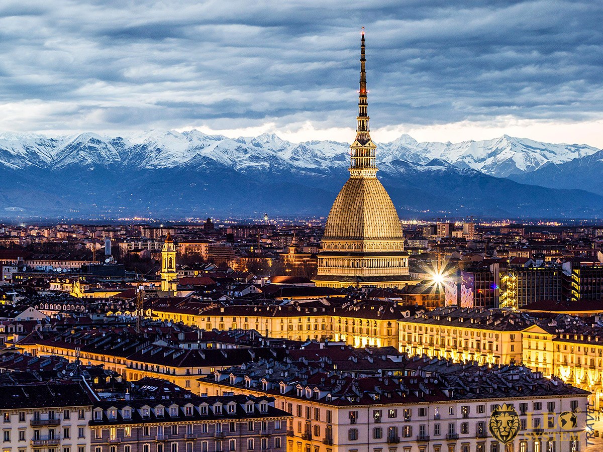 Gorgeous night view of the city buildings and architecture of the city of Turin, Italy