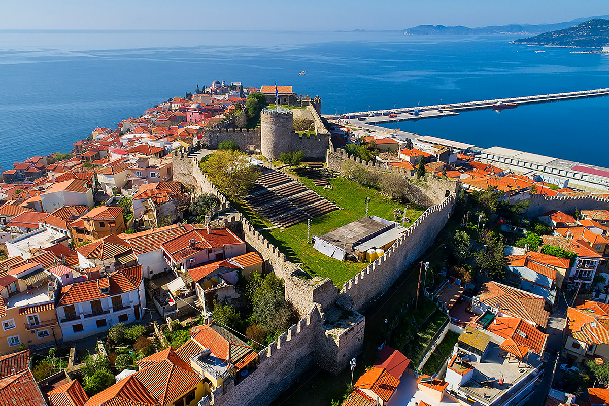 View of the medieval city wall and ancient buildings, city of Kavala, Greece