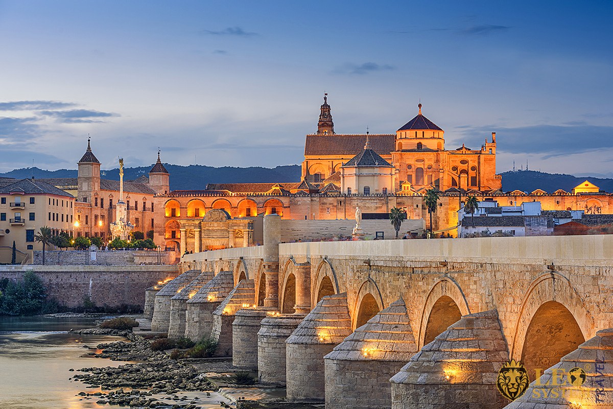 Evening view of the old Roman bridge and Mosque in Cordoba